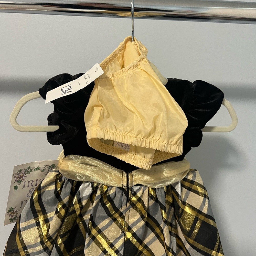 Kids black and gold dress, brand new with tags on!